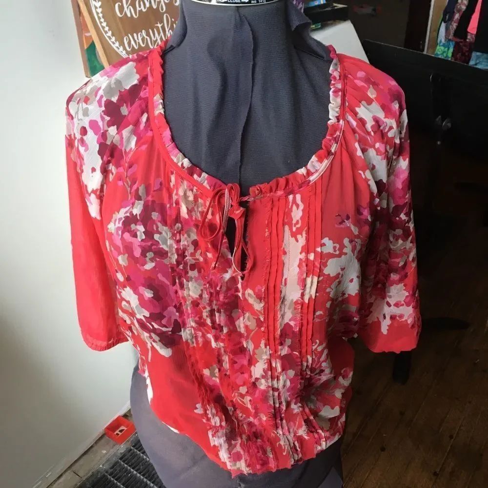 Sheer floral raw hem floral Express blouse